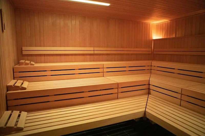 Warm wooden sauna interior at Atlantis Health & Beauty Spa, Tiptree